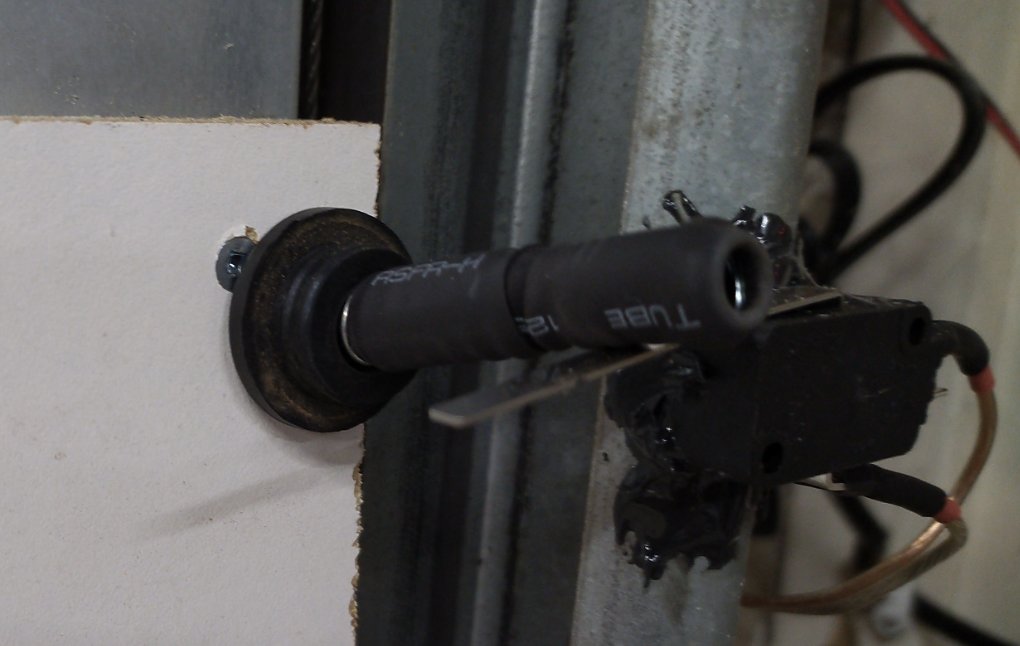 Close-up of the spring material pressing the lever switch